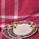 Old plates with fruit decoration