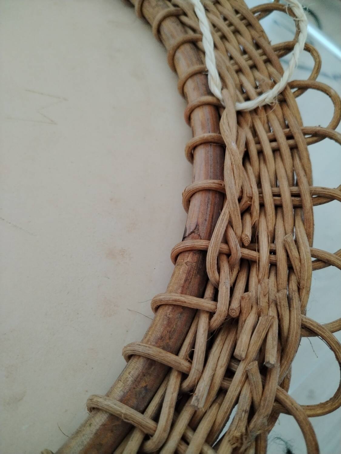 Pretty Soleil rattan mirror, 1950s