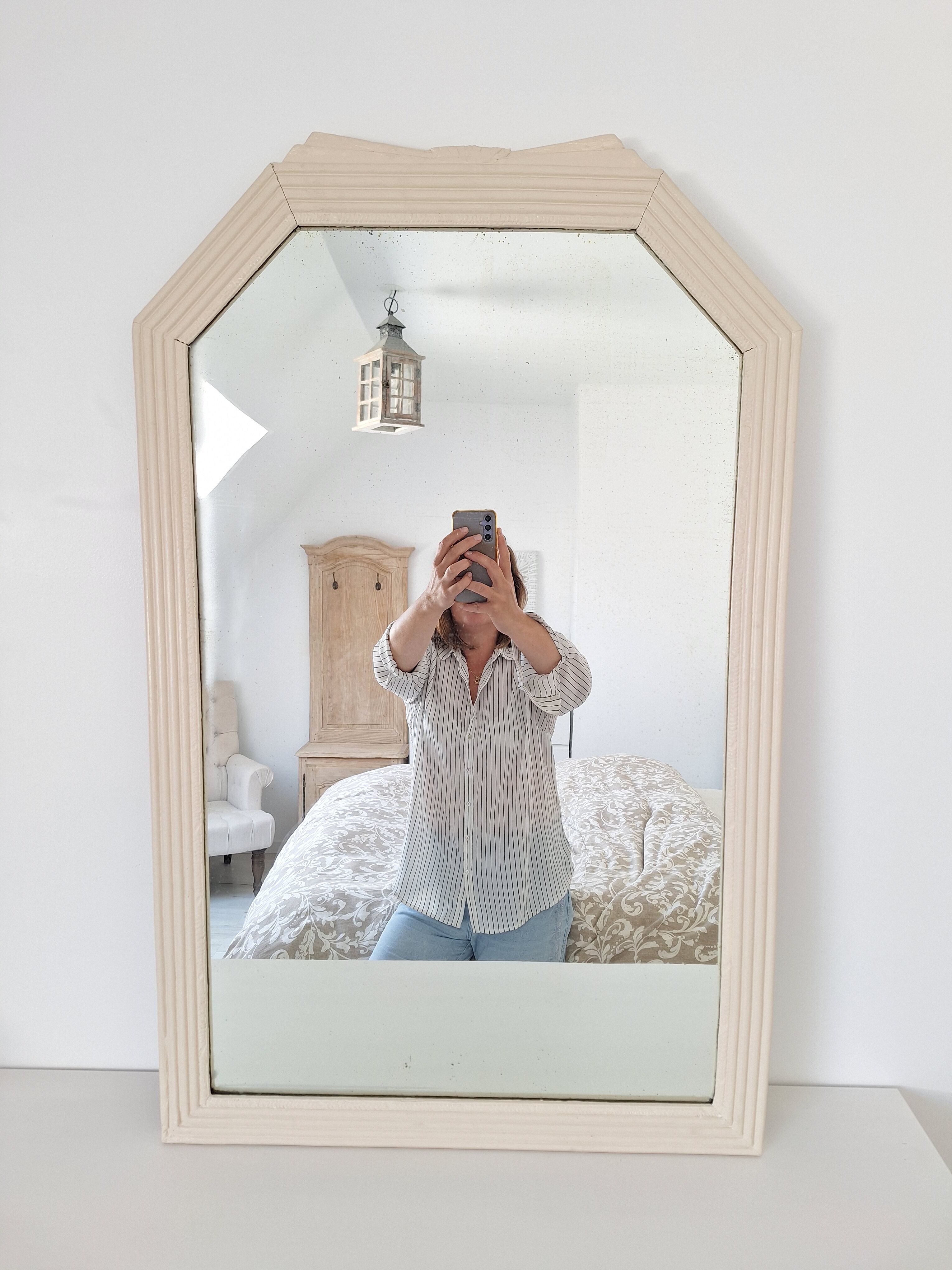 Beige bevelled and moulded mirror