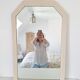 Beige bevelled and moulded mirror