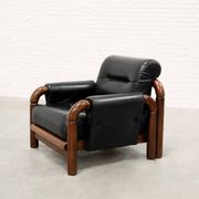 Fauteuil moderniste brésilien en cuir noir et bois massif, années 1970