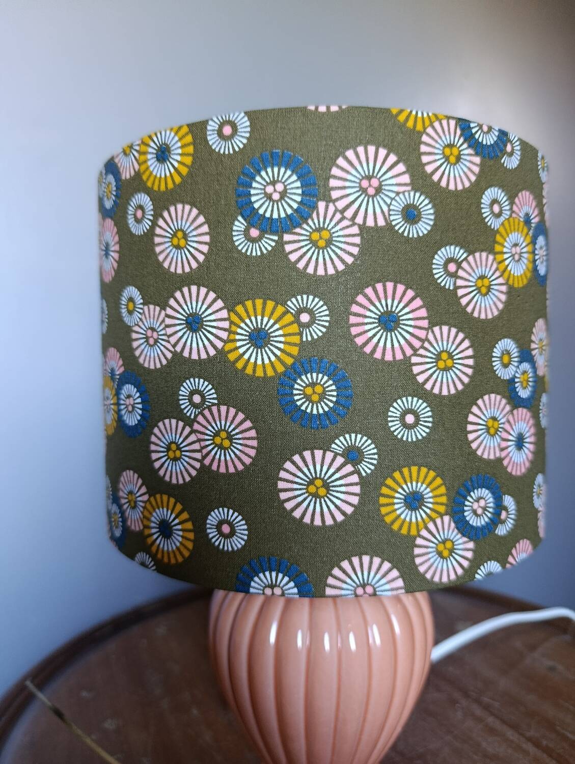 Coral tar ceramic lamp, khaki lampshade with flowers.