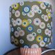 Coral tar ceramic lamp, khaki lampshade with flowers.