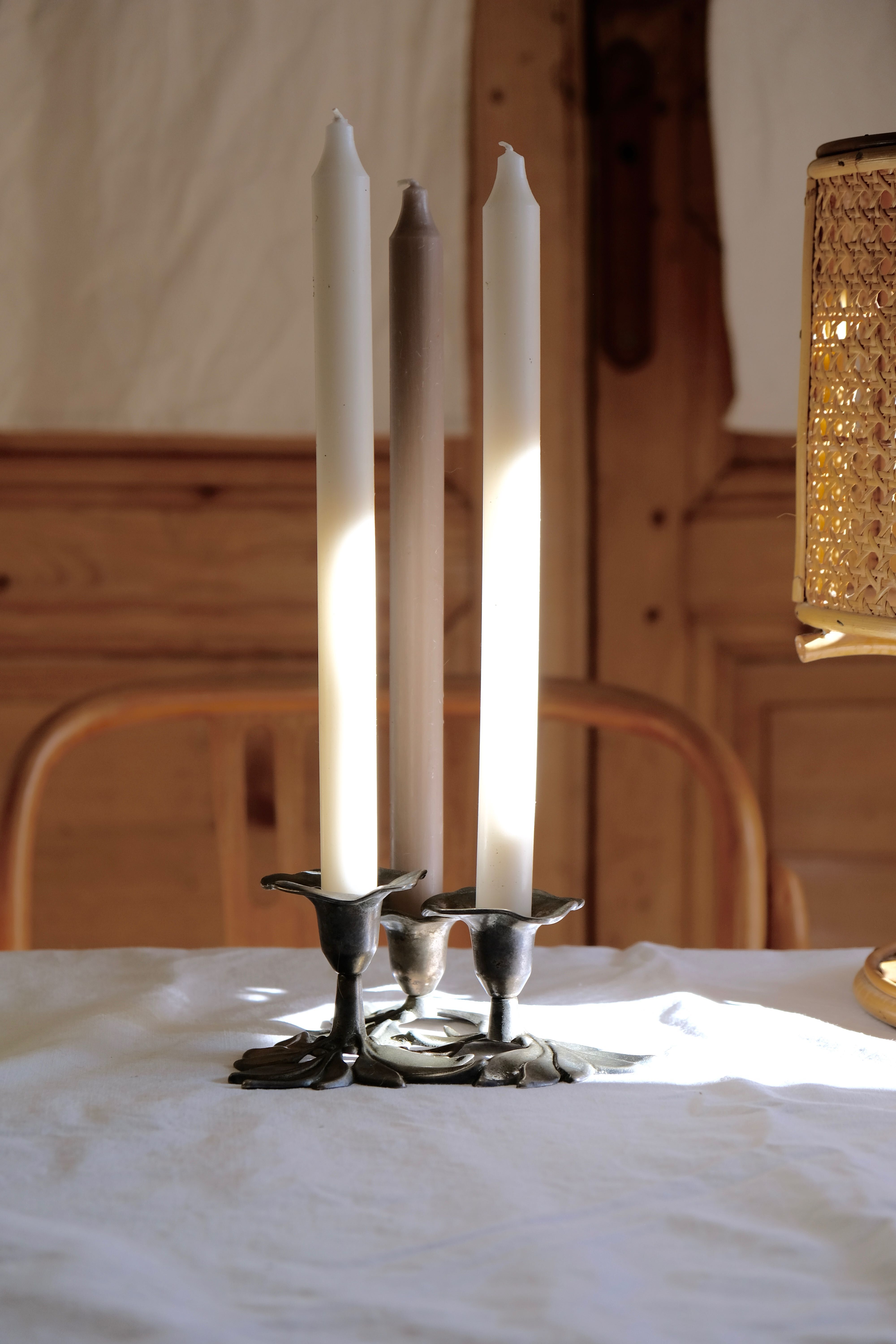 Three-flower pedestal 19th century candlestick