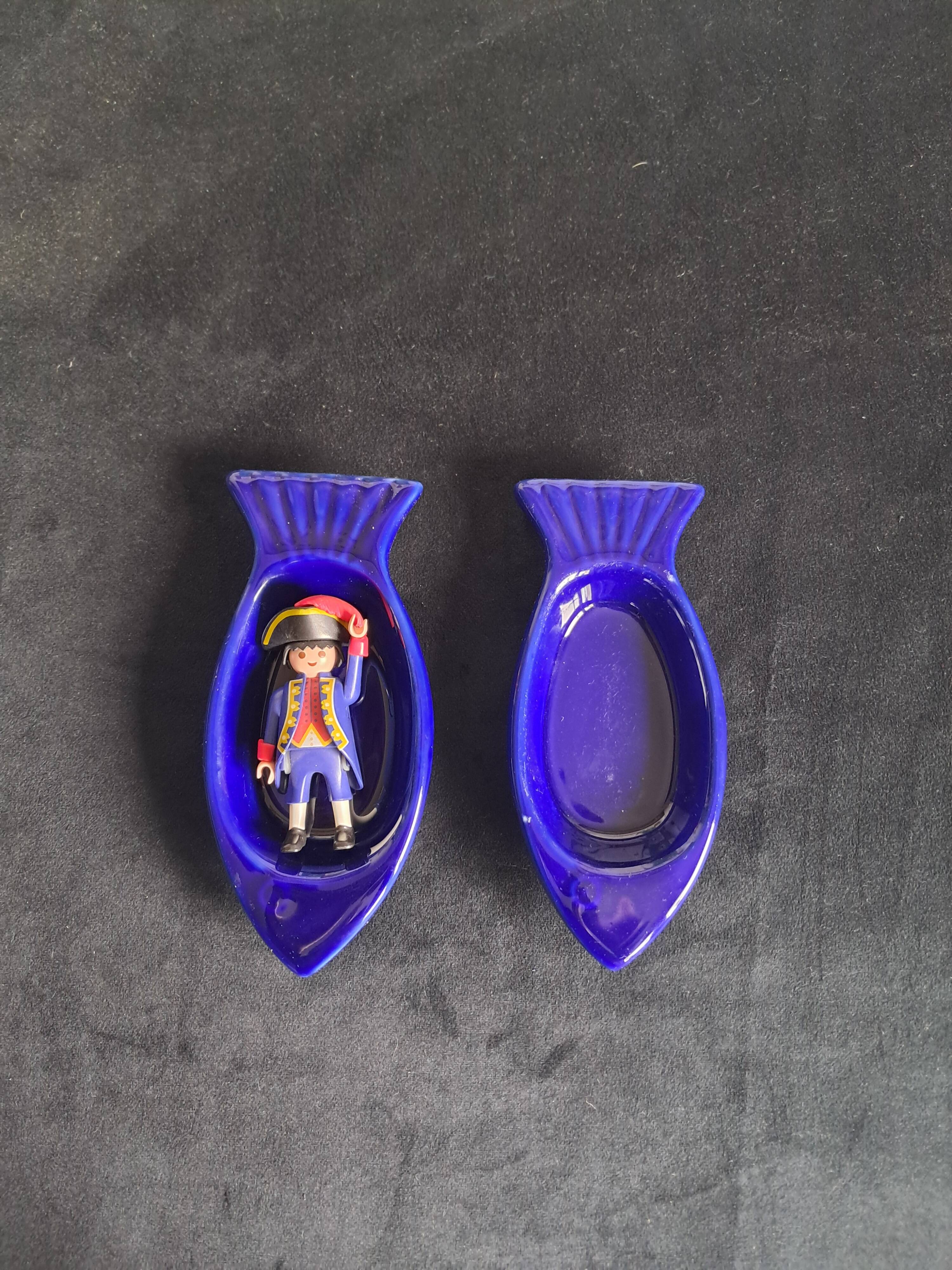 Cobalt blue ceramic plates in the shape of fish (tapas, anchovies, etc.)