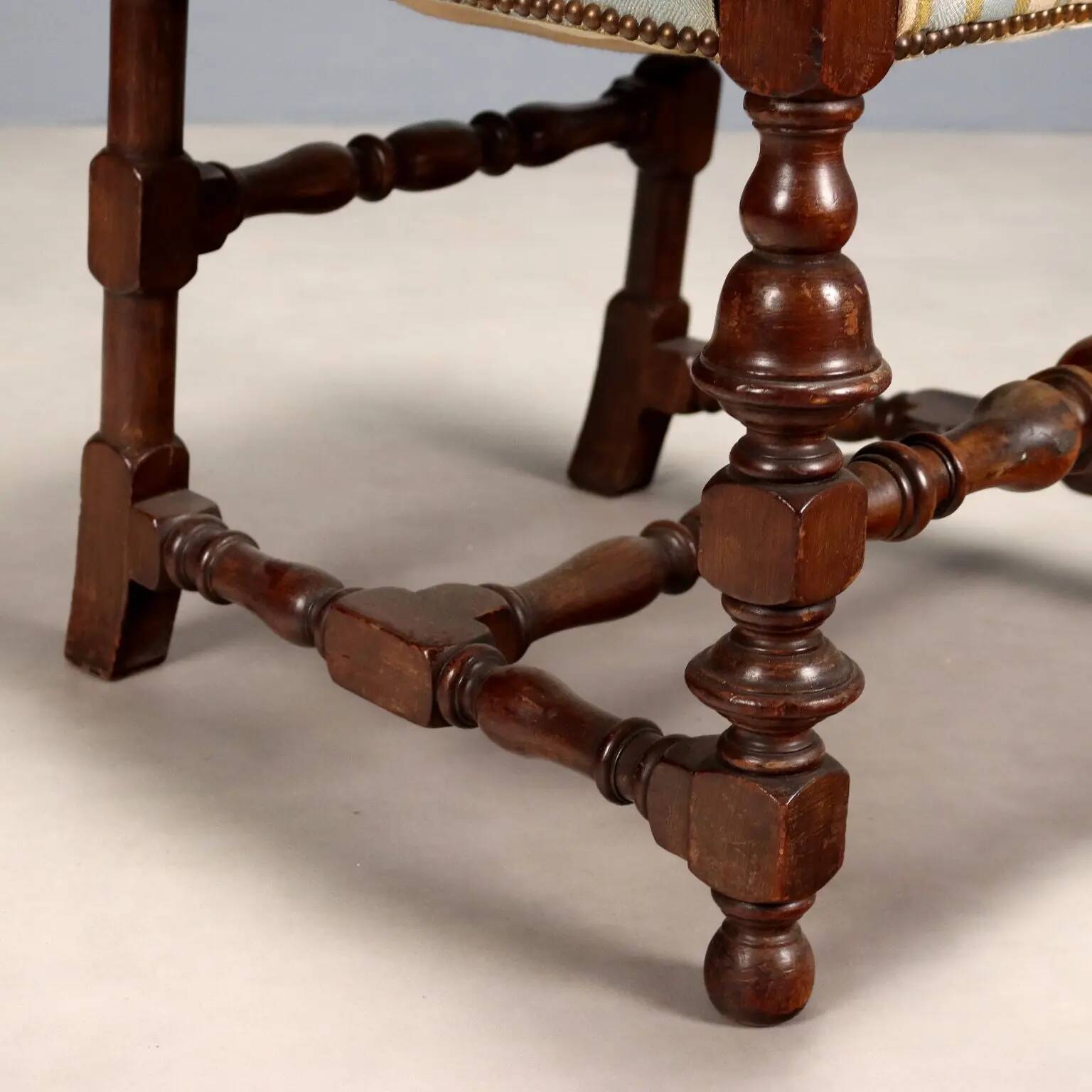 Antique Baroque-style walnut armchair, upholstered, 19th century.