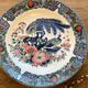 Japanese earthenware dish with peacock motif