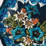 Decorative plate in relief with floral motif