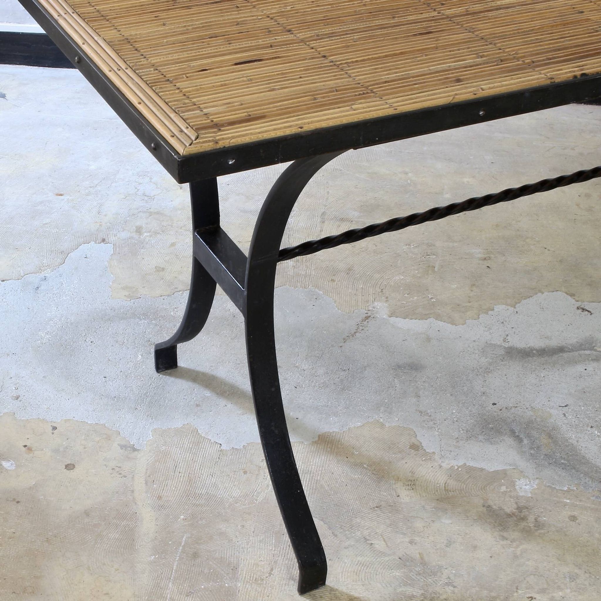Dining table in rattan and wrought iron similar to Audoux & Minet.