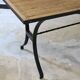 Dining table in rattan and wrought iron similar to Audoux & Minet.