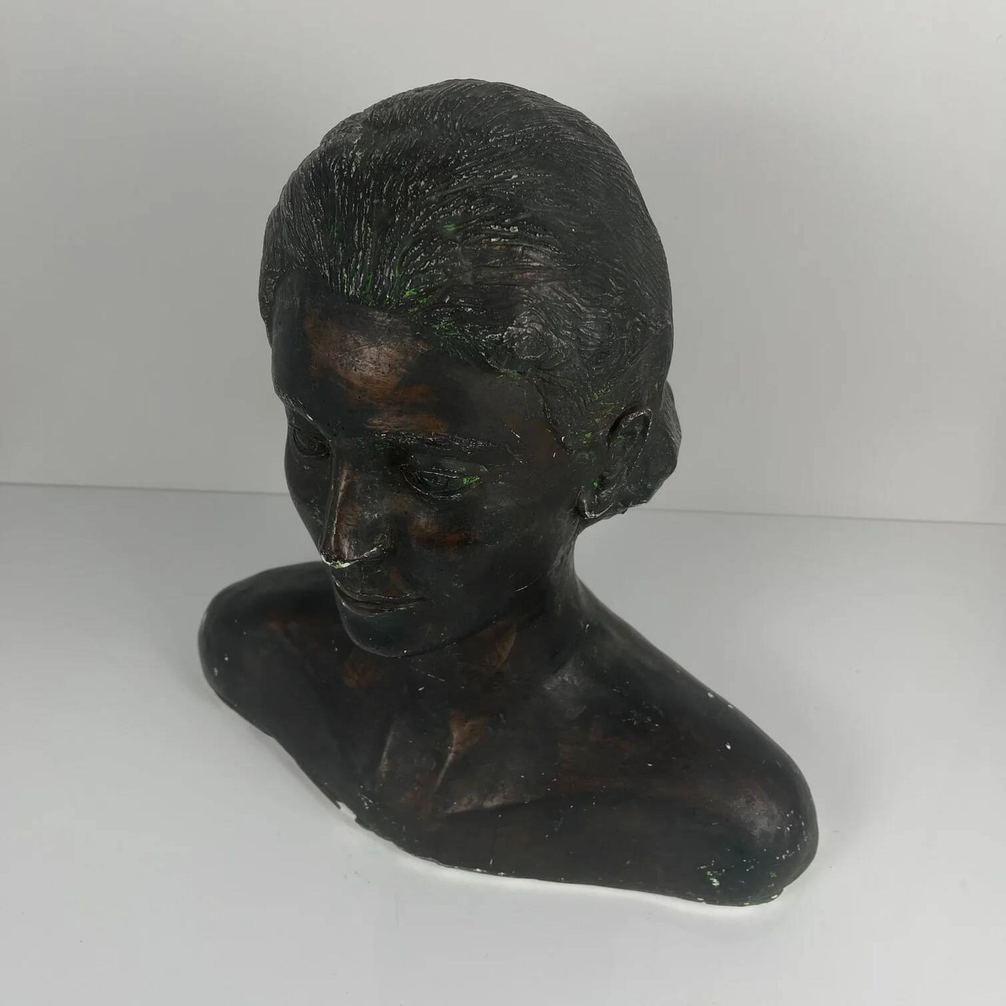 Female bust in neoclassical style in plaster by M. Mongey, 20th century.