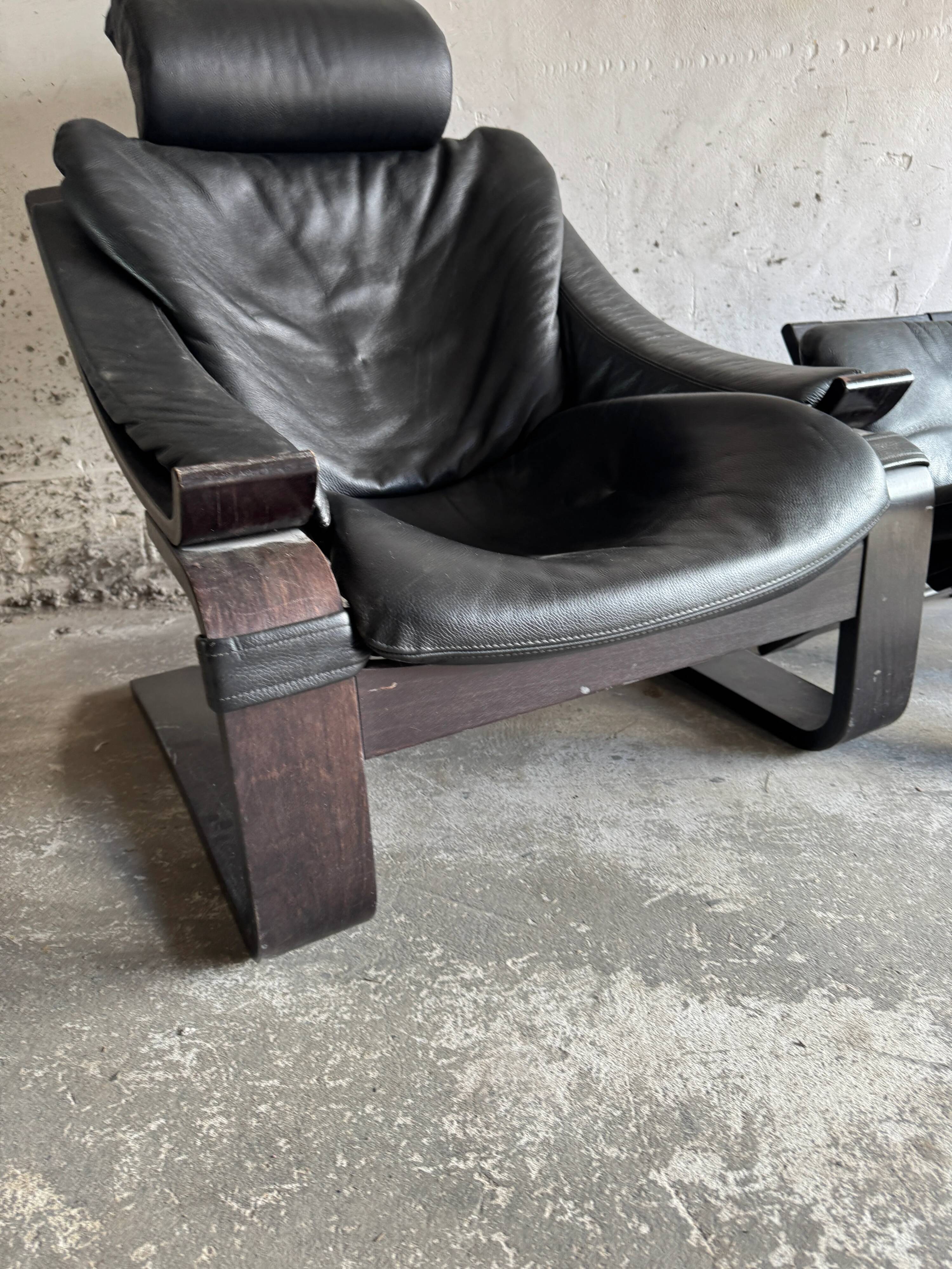 Vintage Scandinavian Black Leather Armchair with Ottoman — Solid Dark Wood Frame, Mid‑Century Modern