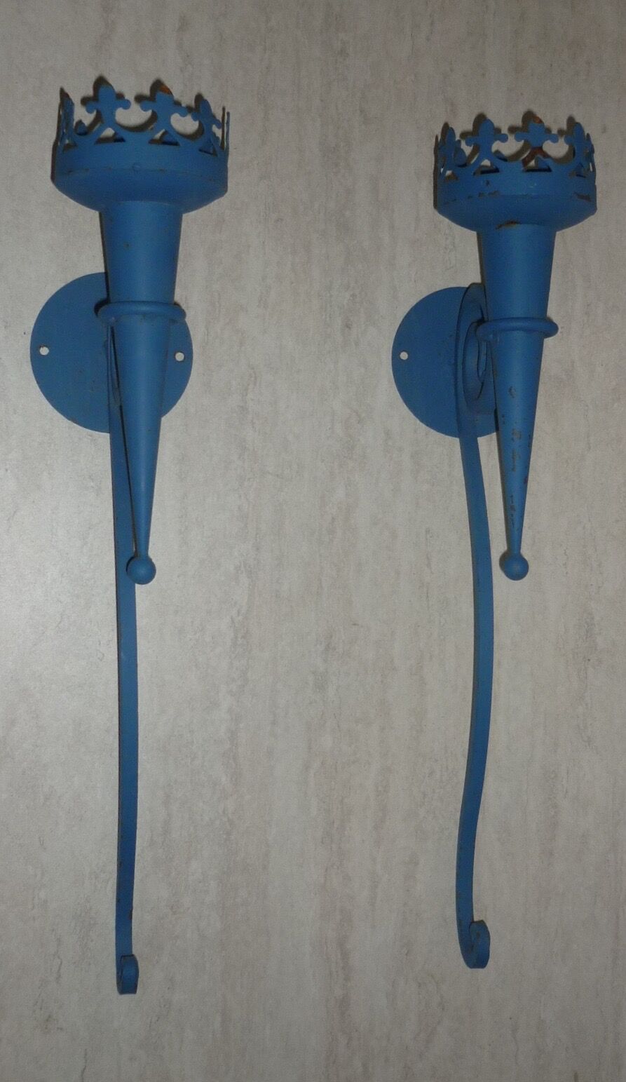 Pair of candle holders, blue torches