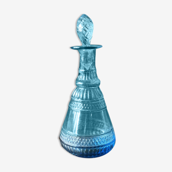 Carafe in blue chissed glass  and its pine cone-shaped cap