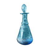 Carafe en verre bleu ciselé et son bouchon en forme de pomme de pin