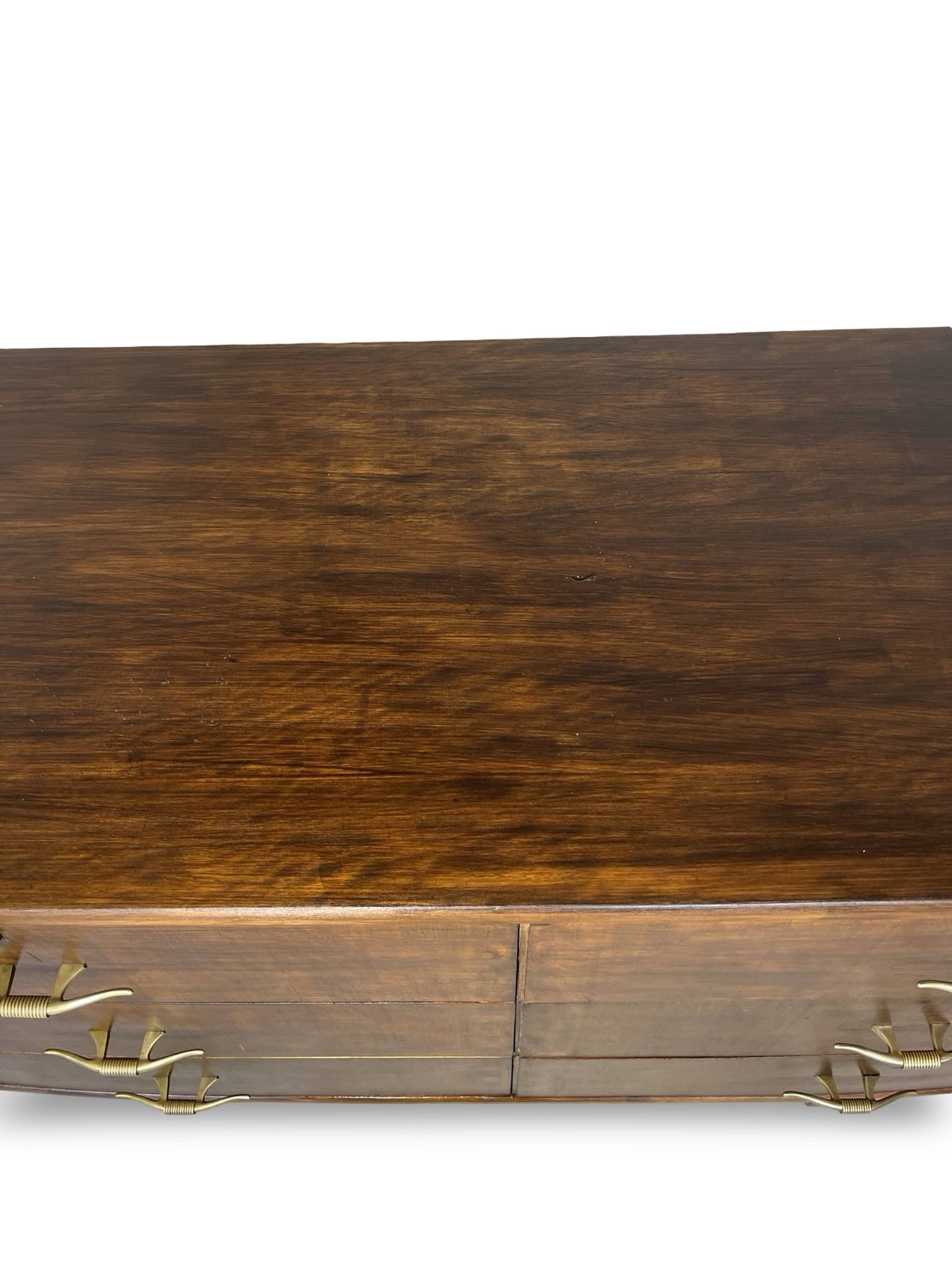 A vintage Italian chest of drawers, made of veneered walnut and solid wood,