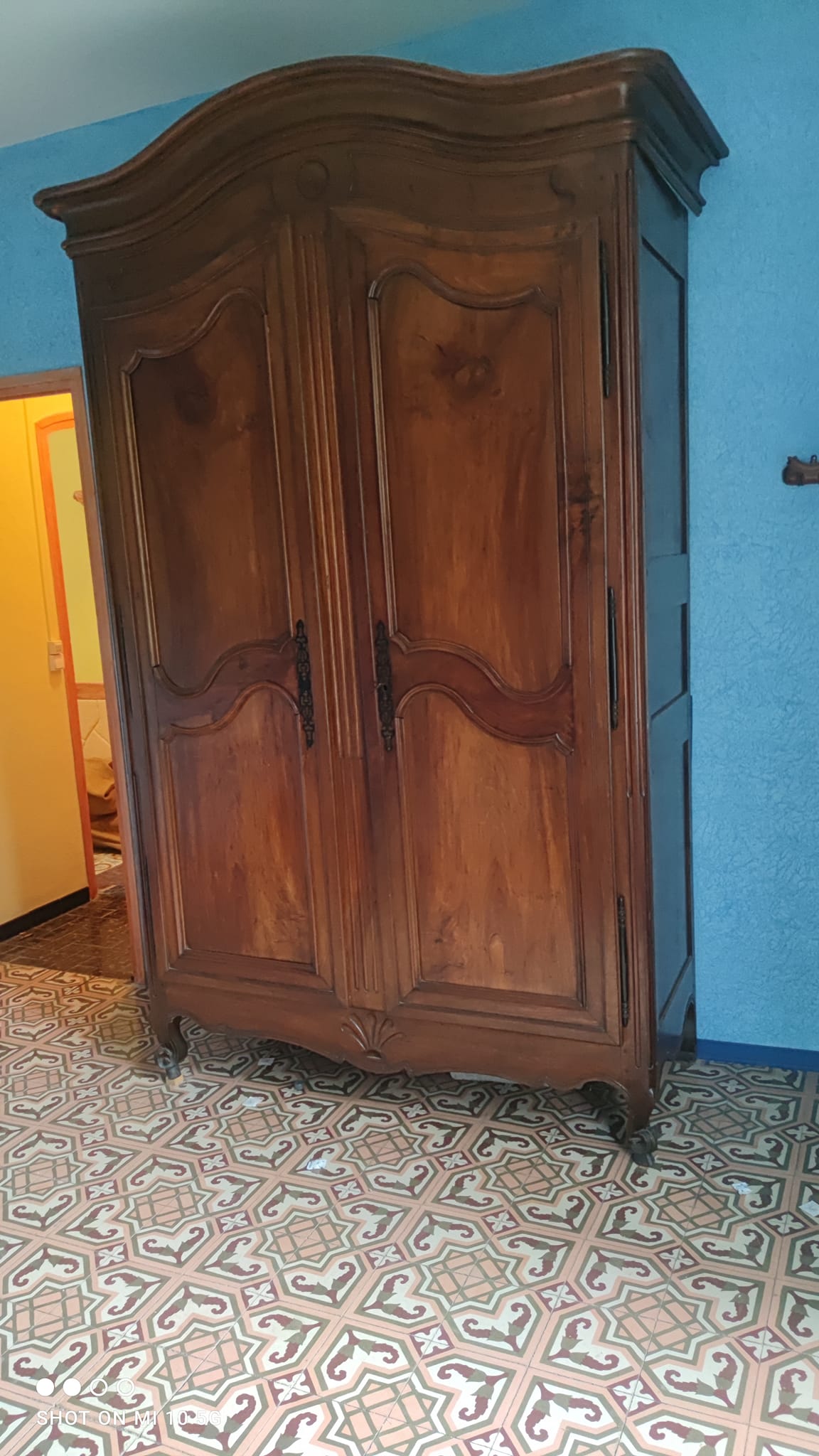 Large Louis XV style gendarme's hat-shaped wardrobe