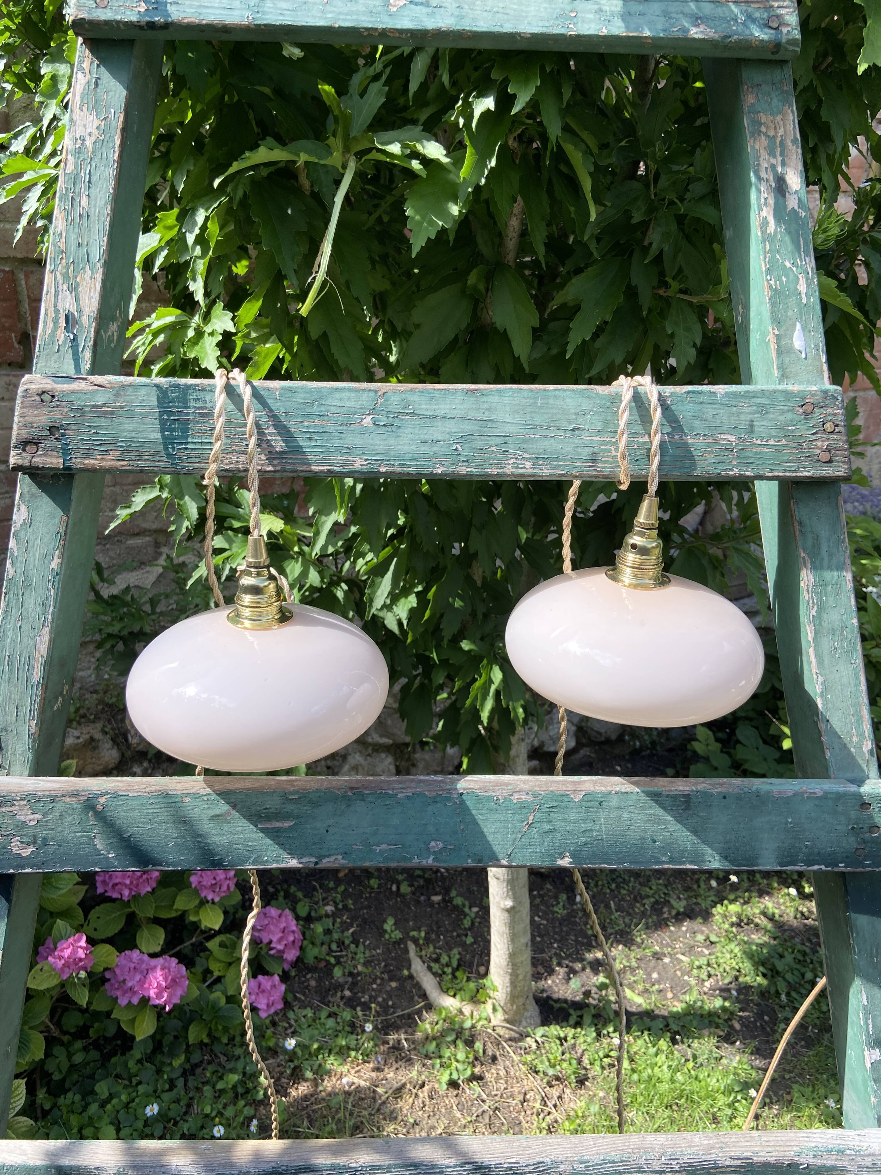 Vintage powder pink opaline globe player 1950