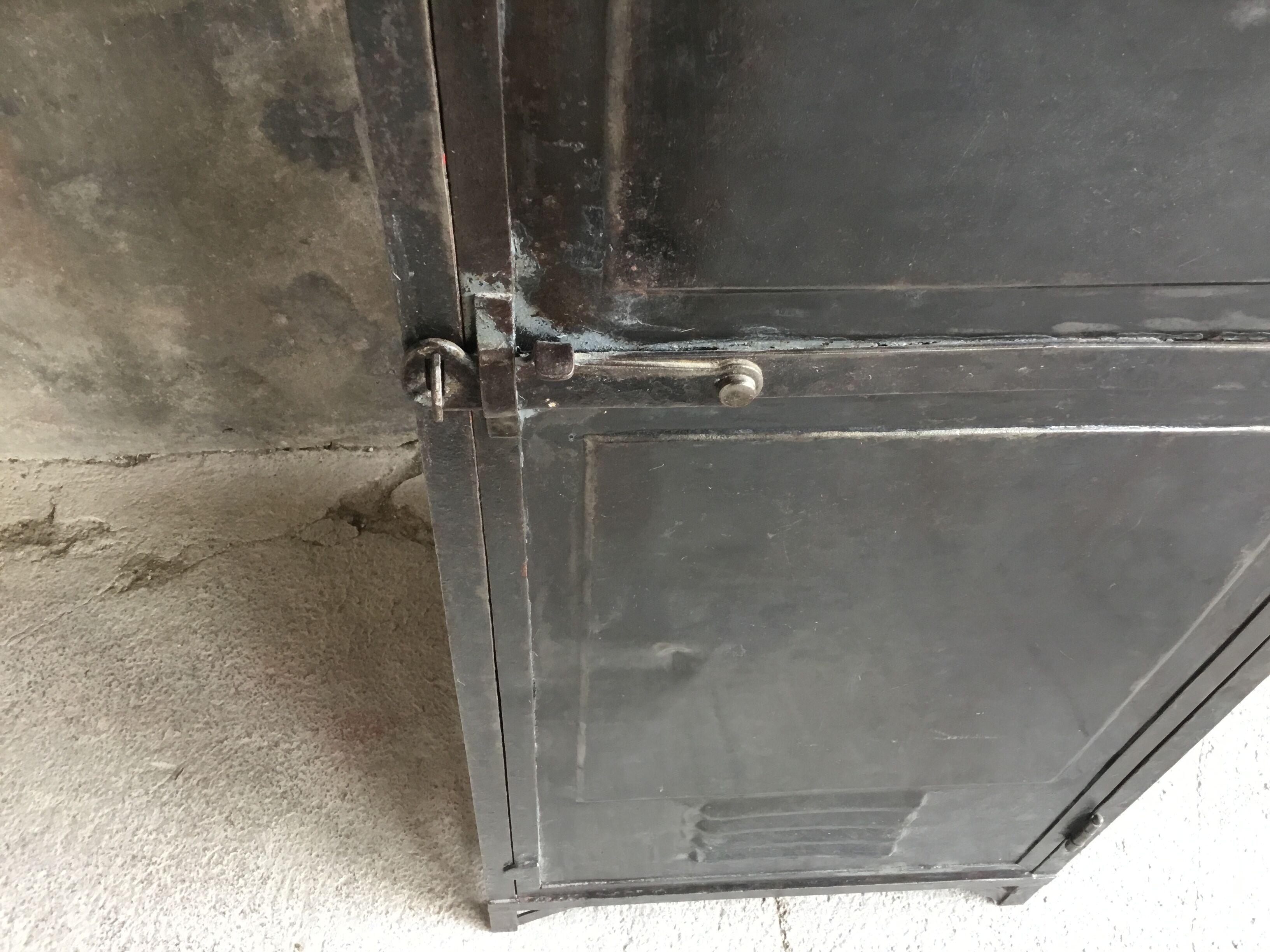 Riveted cloakroom converted into storage cabinet - early twentieth century