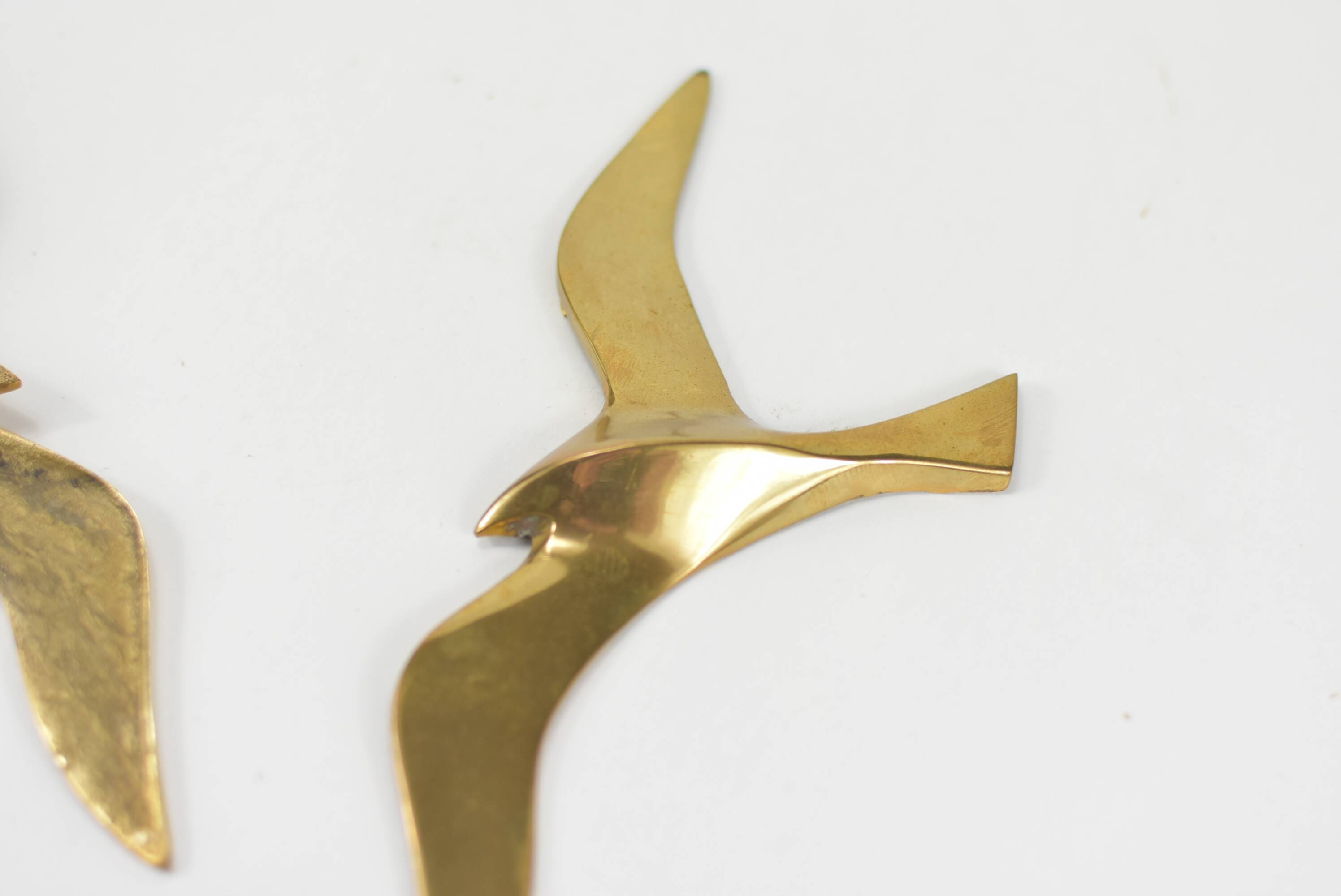 Pair of brass birds