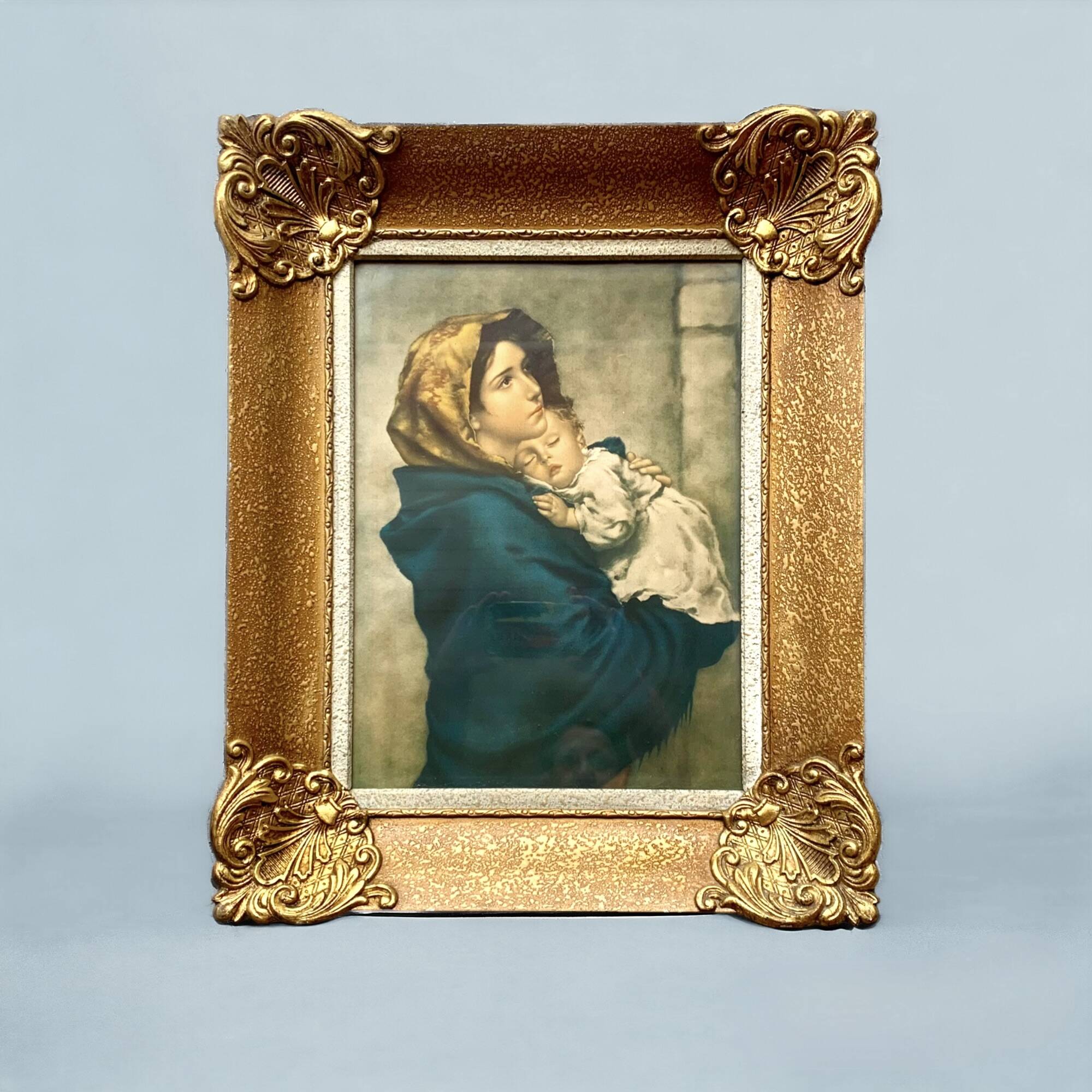 Old wall frame in carved gilded wood