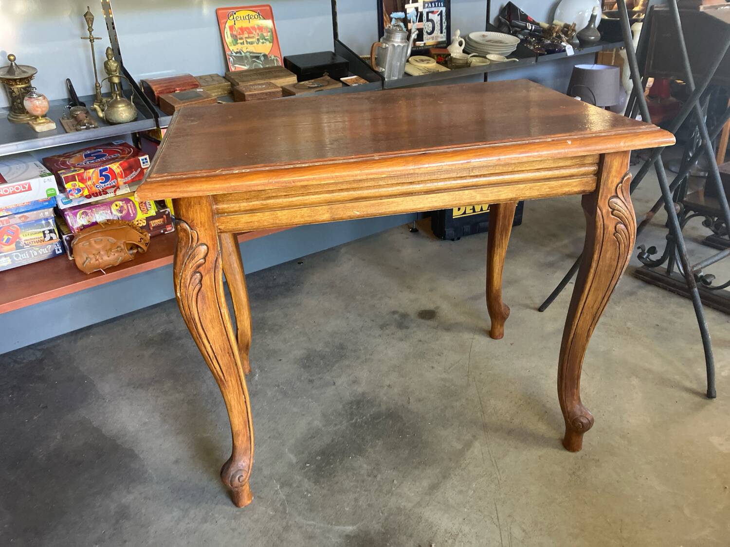 Wooden table, carved legs