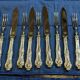 Service of 12 fruit knives and 12 forks by Mappin and Webb.