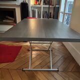 Table that can be transformed into a coffee table with 2 height settings