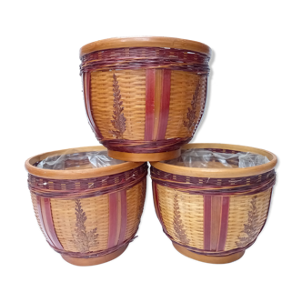 Trio of braided vintage wicker pot covers
