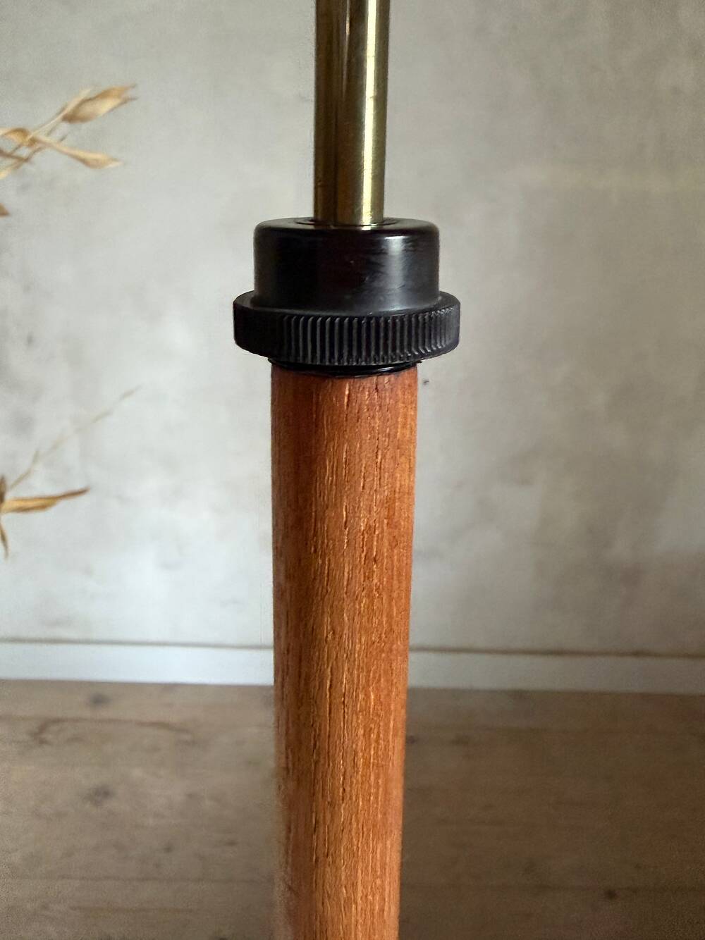 Scandinavian tripod reading lamp in teak and brass.