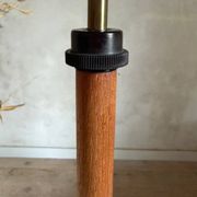 Scandinavian tripod reading lamp in teak and brass.