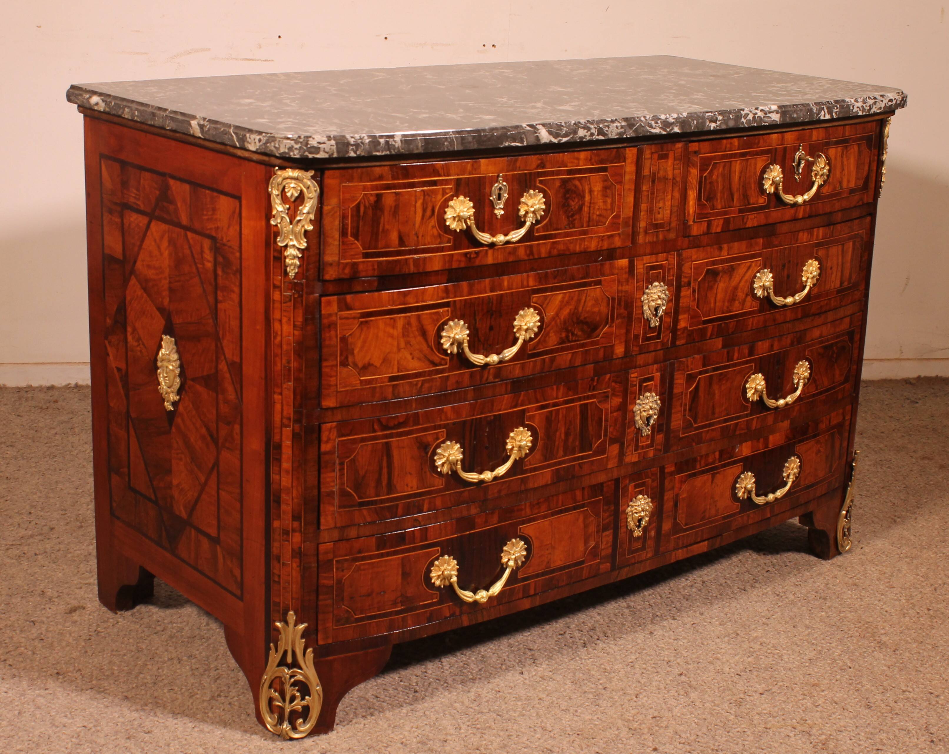 Dauphiné commode from the Louis XIV period in olive wood marquetry.