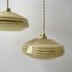 Pair of suspensions in yellow Clichy glass and golden border 40s-50s