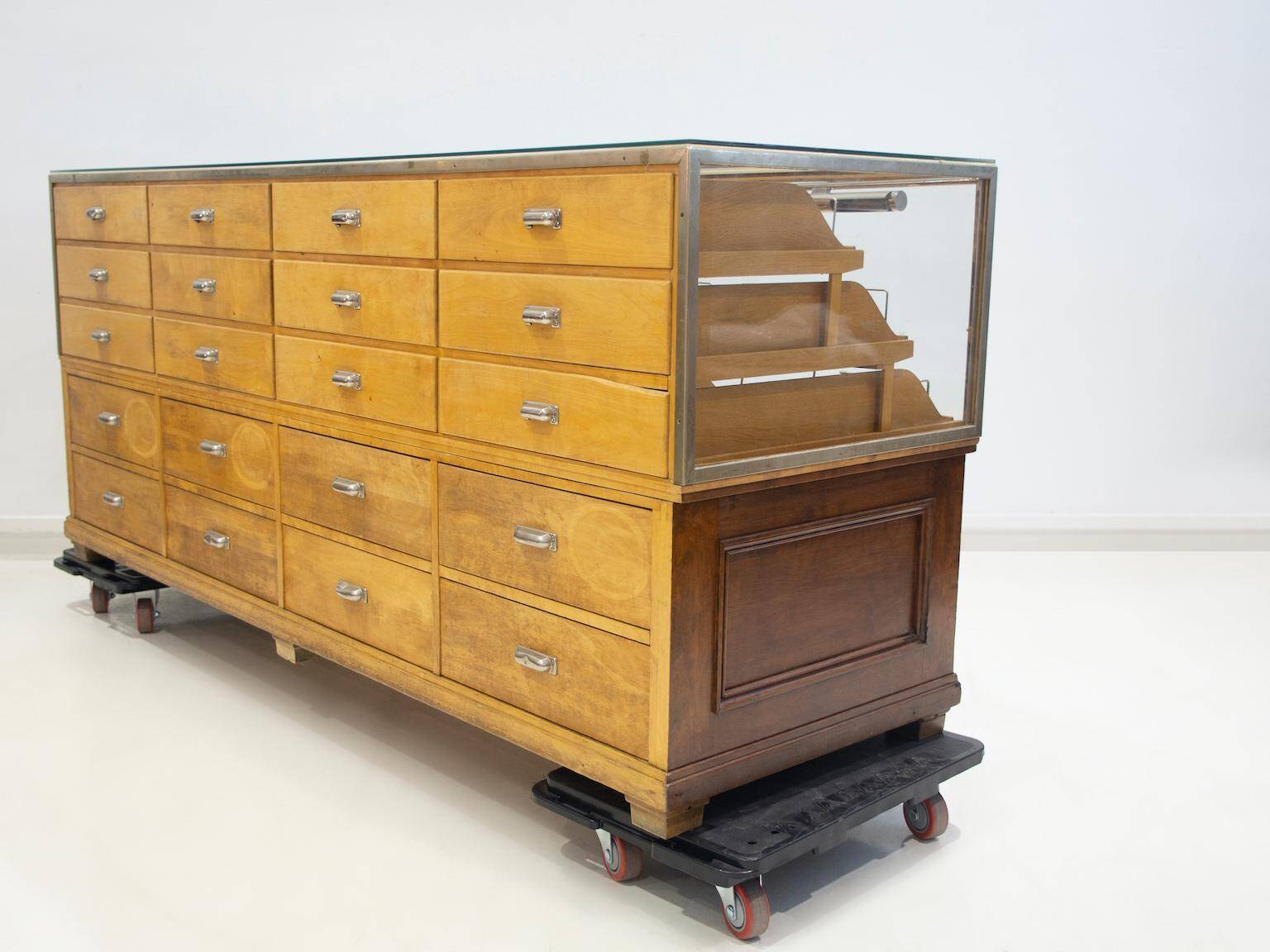 Shop counter made of birch and oak with twenty drawers, 1940s.