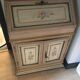 Secretary in pine, wood painted with floral patterns.