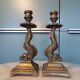 Pair of bronze dolphin candlesticks