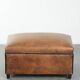 Characterful sheepskin footstool/ottoman finished with black piping