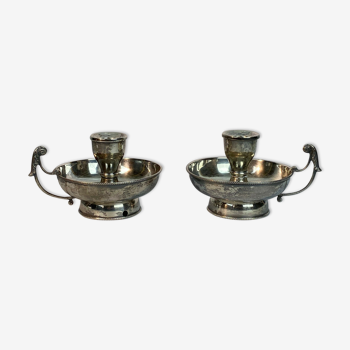 Pair of hand candlesticks from the nineteenth century in solid silver