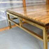 Table basse Guy Lefevre maison Jansen, laiton doré et travertin