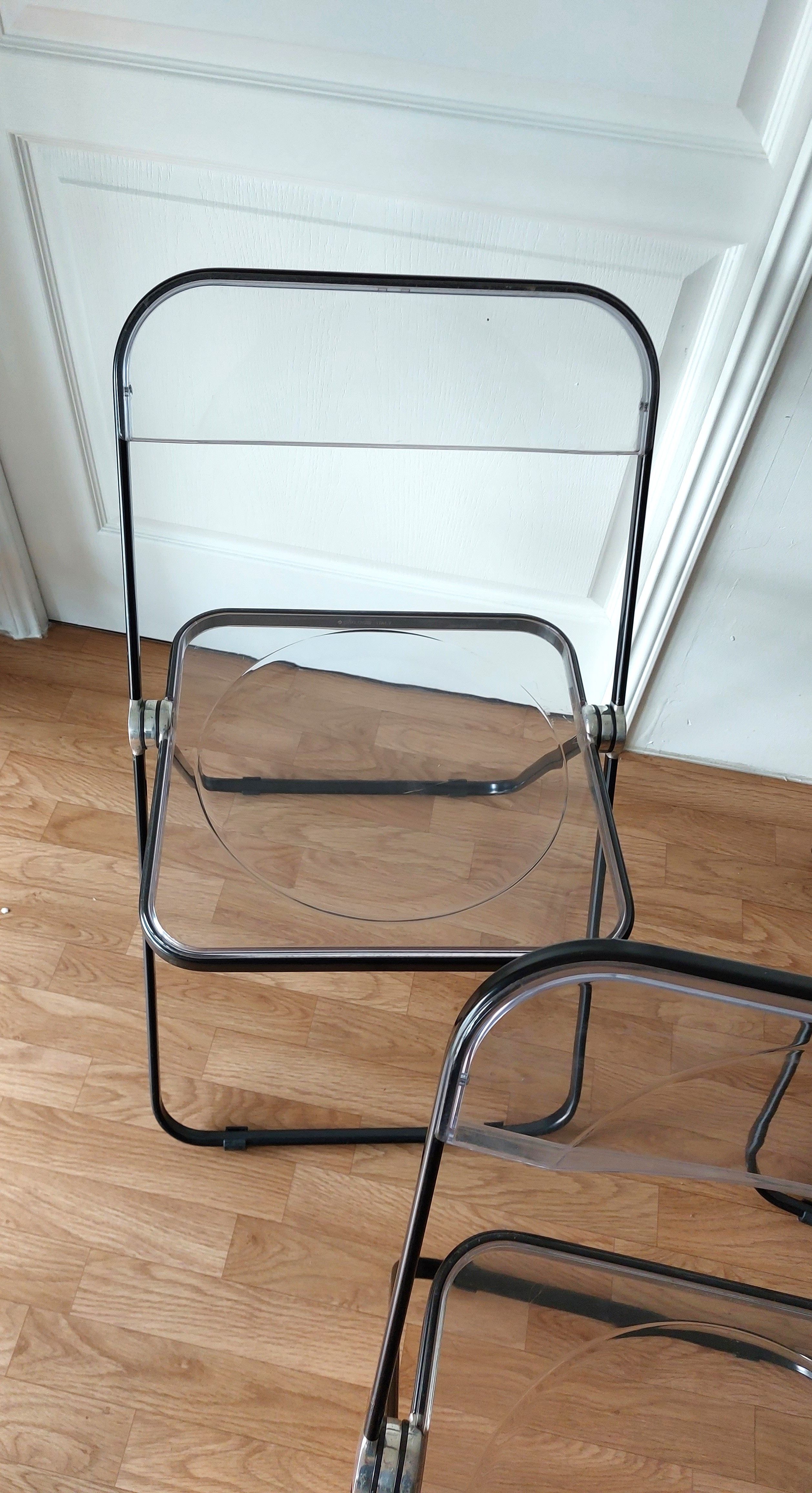 Series of 3 black and transparent Plia chairs Giancalo Piretti for Castelli, 1980.