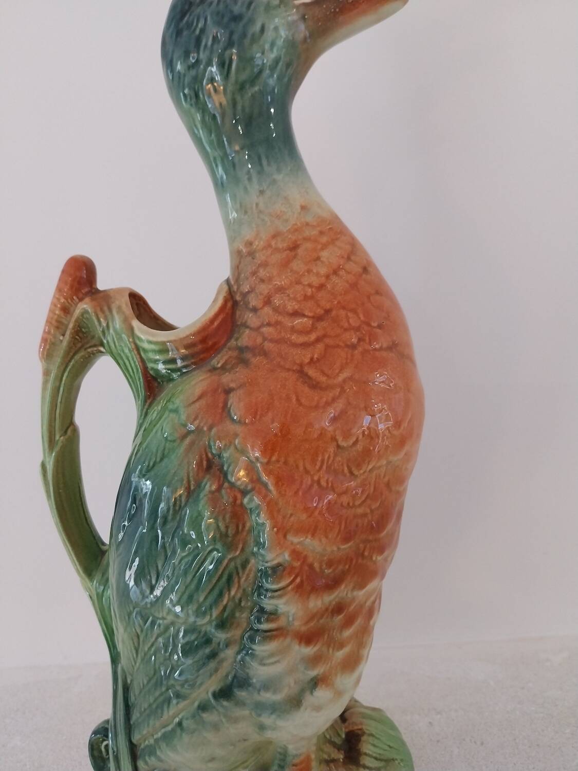 Water jug in slipware from the 1960s. Decorated with a coloured duck. Unmarked.