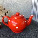 Vintage red teapot with white polka dots
