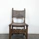 Set of 8 Gothic-style chairs in oak and studded leather.