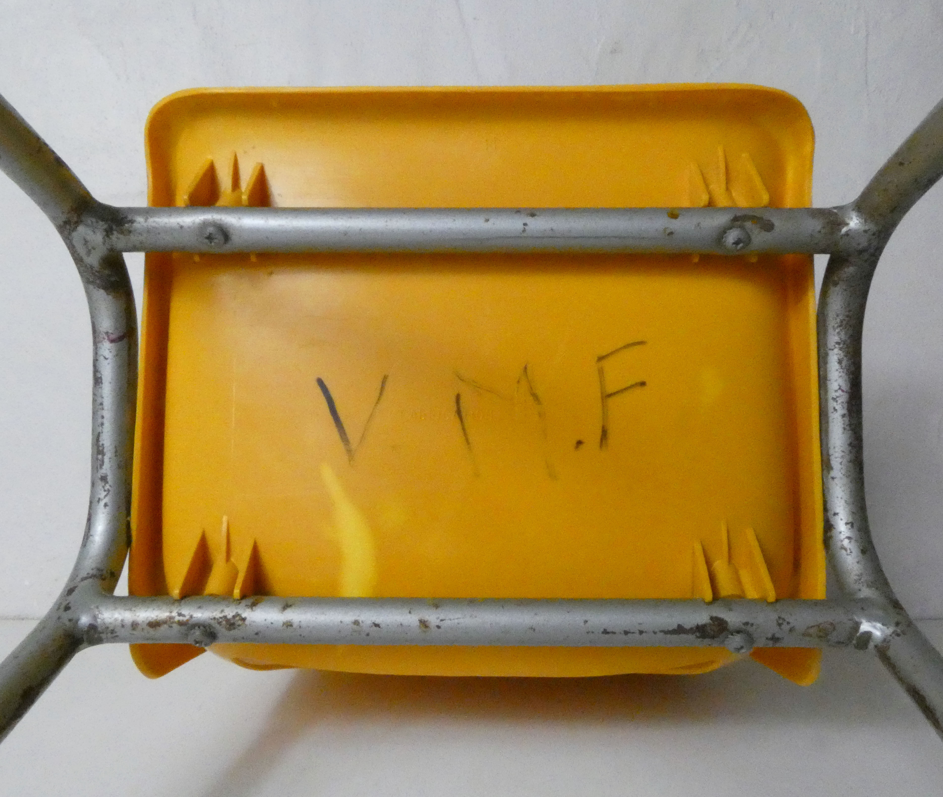 yellow plastic child chair