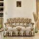 Napoleon III floral toad sofa with boudoir spirit and sliced backrest.