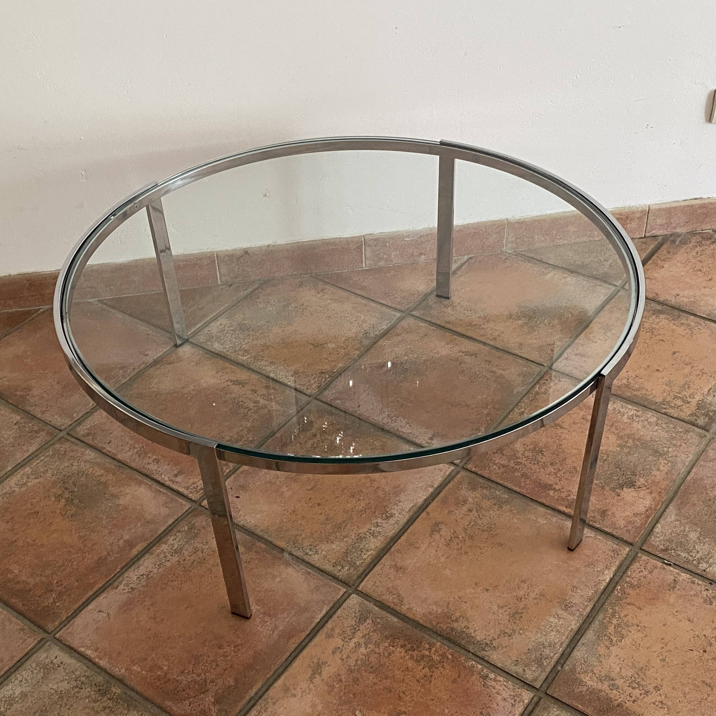 Space Age coffee table. 1970s. Chrome-plated steel and glass.