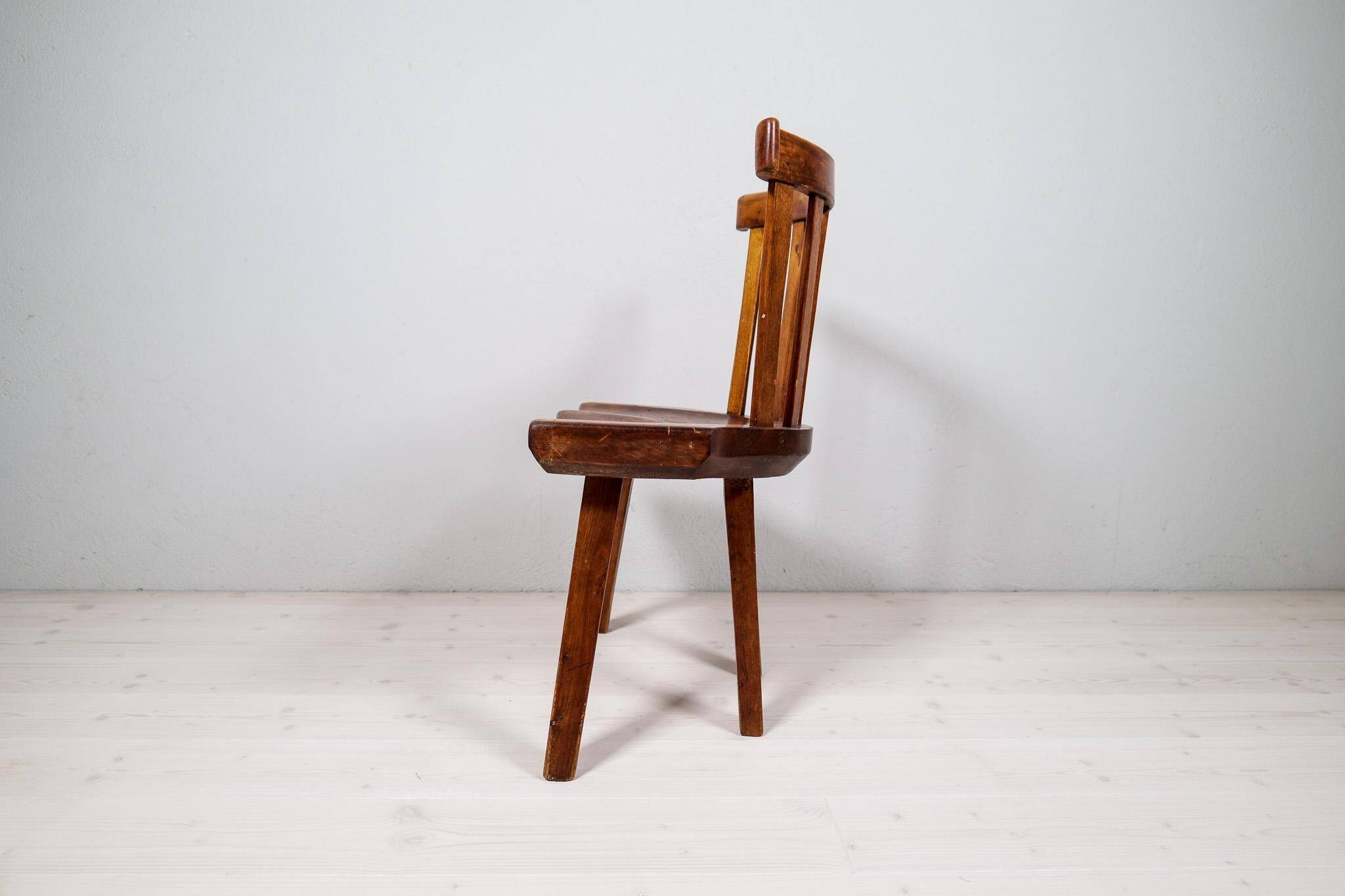 Swedish folk art chair from the 19th century with highly decorative forms.