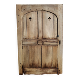 Oak door with clover-shaped oculus