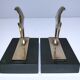 Pair of designer black marble bronze fish bookends