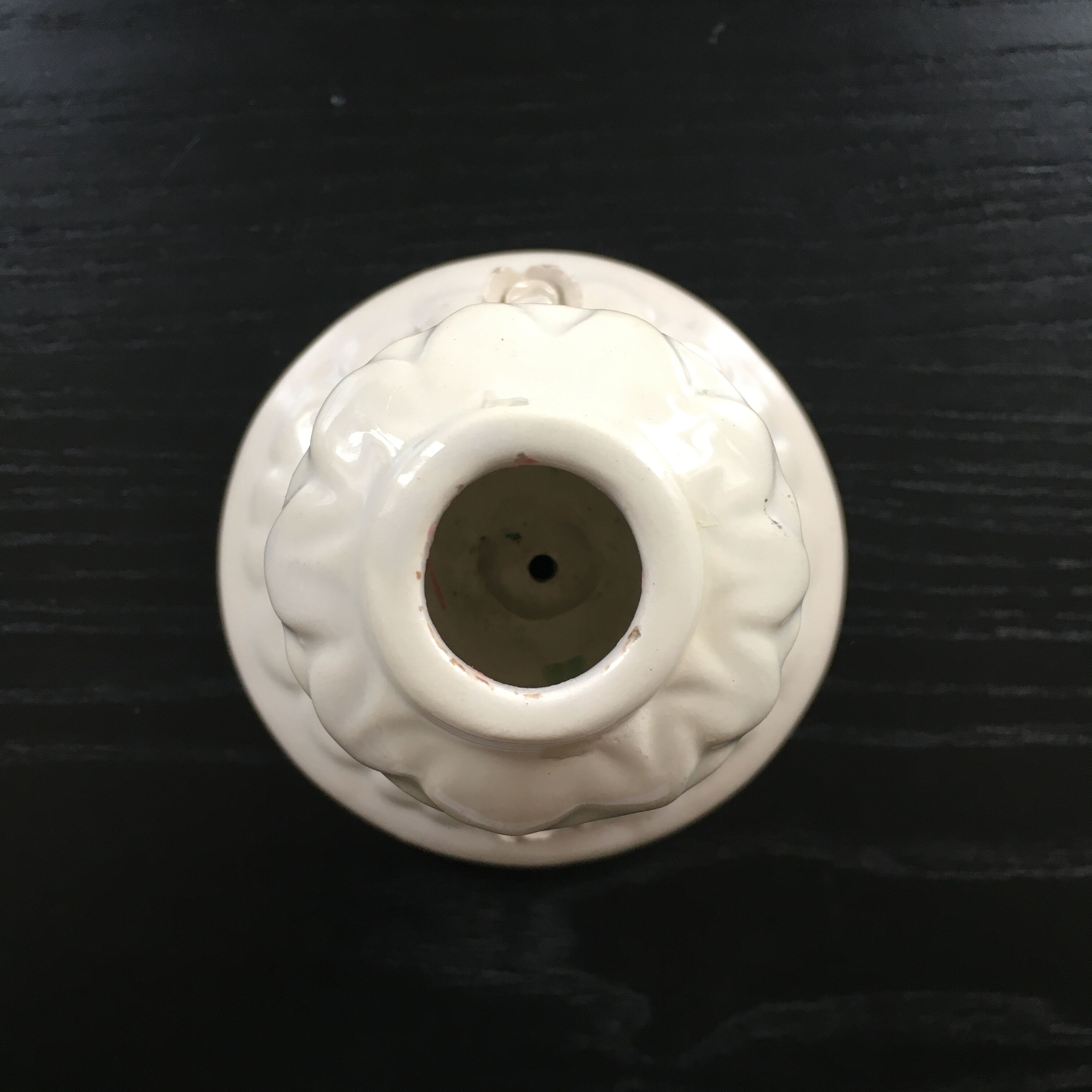 Ivory candle holder with barbotine decor